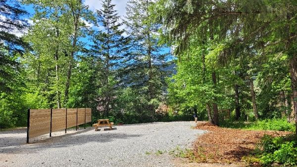 Camp site with shaded trees near Mara Lake and south of Sicamous, Shuswap campground