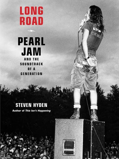 Long Road book cover with Eddie Vedder standing on speaker in Seattle 1991.