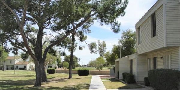 SOLD $189K: 3 Bed/2.5 Bath townhome with views of the golf course! Expanded private patio, extra storage, and assigned covered parking too!