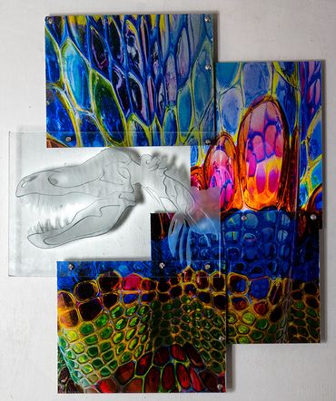 Close up, colorful photo of reptile skin across 4 metal tiles and 1 etched glass tile with dinosaur