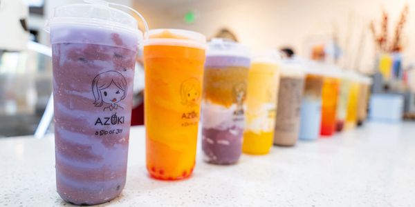 A spread of Azuki Tea drinks, ranging from our taro lover milk tea to our mango smoothie!