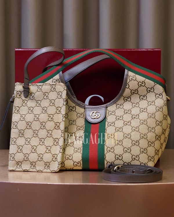 Gucci handbag set with signature GG pattern and green-red-green stripe.