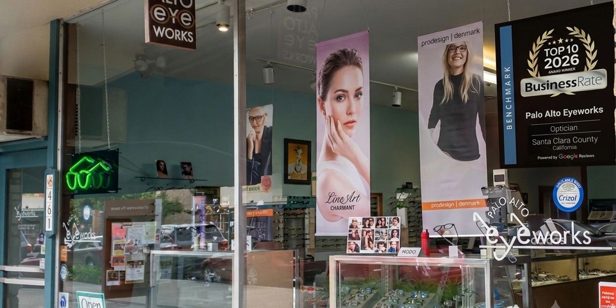 Eyewear shop with large glass windows and promotional posters.
