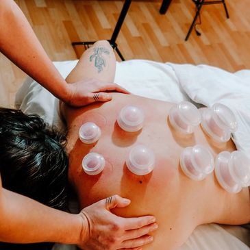 massage therapy with cupping at Metta Integrative Wellness Cooperative in Baltimore, MD