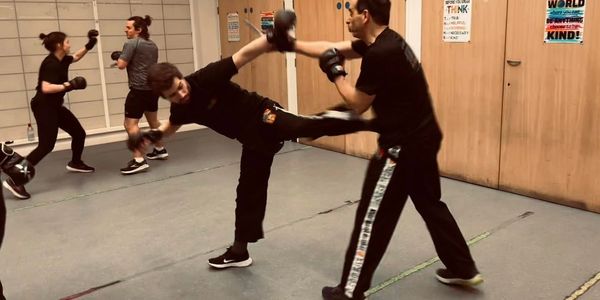 Students training Krav Maga with defence and kick – Echelon Krav Maga London London Bridge