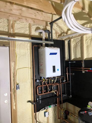 Navien Tankless and Combi Install by EarthTech Systems