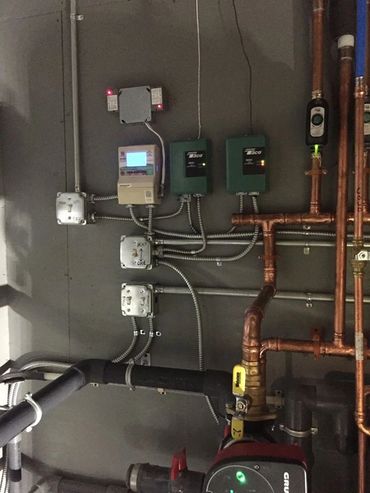Old HBX Controls for a geothermal heating and cooling system by EarthTech Systems