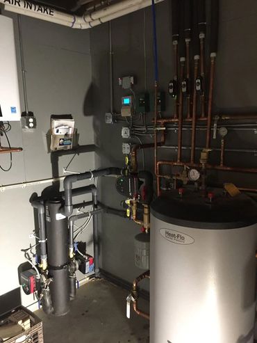 Geothermal Water to Water System Well Piping by EarthTech Systems