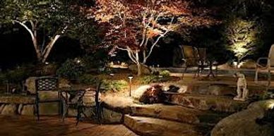 Cozy garden patio lighting at night.