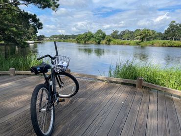 A bicycle parked on a wooden pathway on Hilton Head Island in Palmetto Dunes. Bike Rentals Available