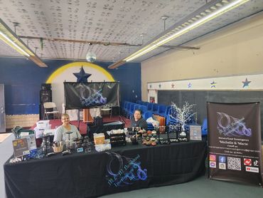 Our vendors table at Poasttown Paracon 2025