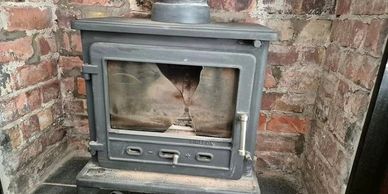 stove glass replacement on log burner in wirral by sean the sweep