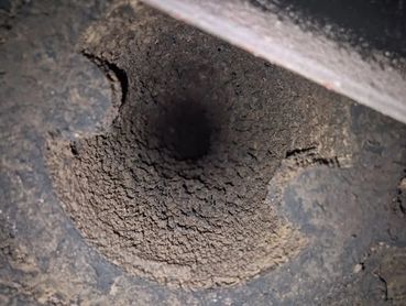 soot build up in chimney that neds sweeping every year