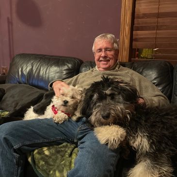 Tracy with his kids furry members.