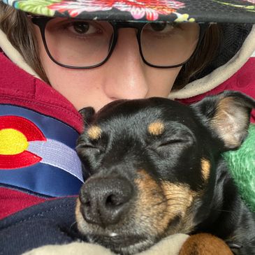 Karl loving on his clients dog.