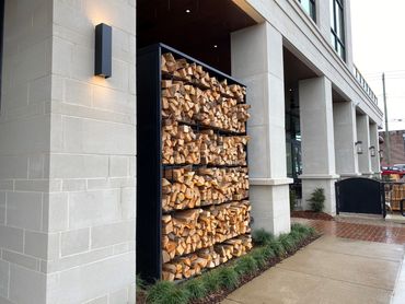Blackened steel firewood rack at Valley Hotel in Homewood, Alabama