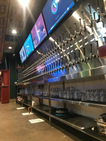 Stainless Steel draught beer panel and catch trough with storage at On Tap in Vestavia Hills, Alabam