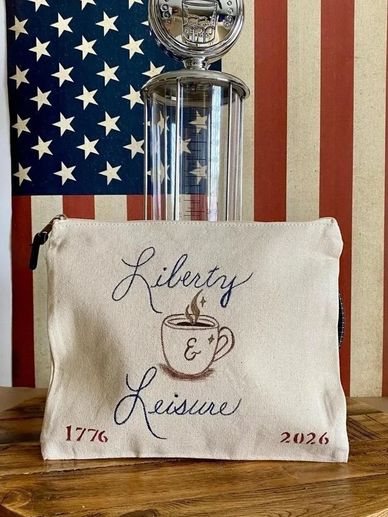 A hand-painted canvas zip pouch influenced by coffee rituals, summer travel, and American leisure.