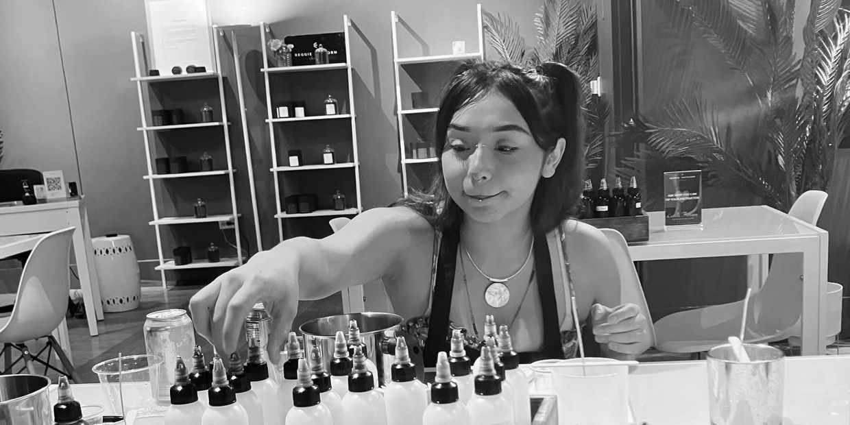 One of the mentees explored scents for her candle at a Candle Making Class.