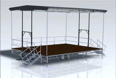 Portable stage with canopy and stairs for events.