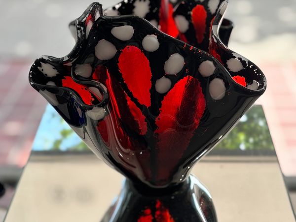 Handcrafted, red and black ruffled glass bowl by Rebecca  of The Glass House, showcasing bold color