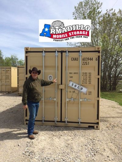A happy Texas customer picking out his storage container