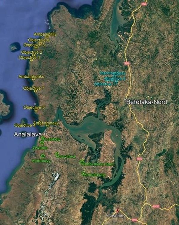 Satellite map showing labeled objectives and locations in a coastal region.