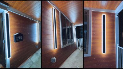 Automated smart exterior architectural lighting system illuminating a luxury residential building fa