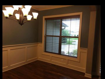 accent wall, wainscoting, painted trim, wood trim