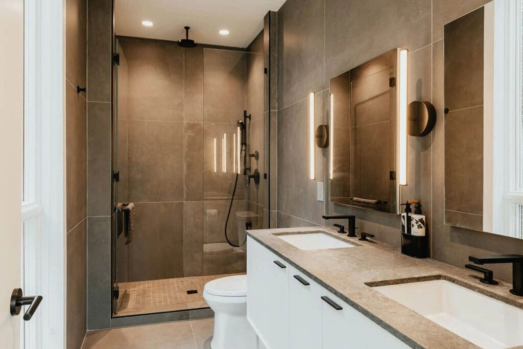 Full luxury bathroom with lights on the wall installed in Denver Colorado. Free estimate available