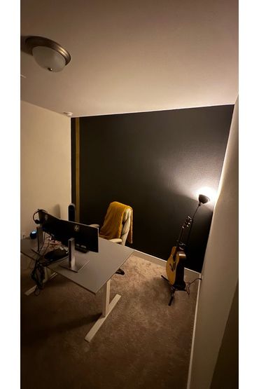 The image shows a corner of what appears to be a bathroom or a similar interior space