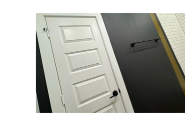 The image shows a corner of what appears to be a bathroom or a similar interior space