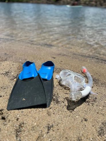 snorkel and fins on the beach