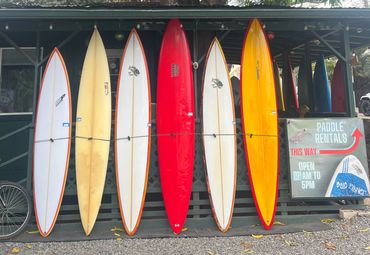 display of big wave surfboard guns