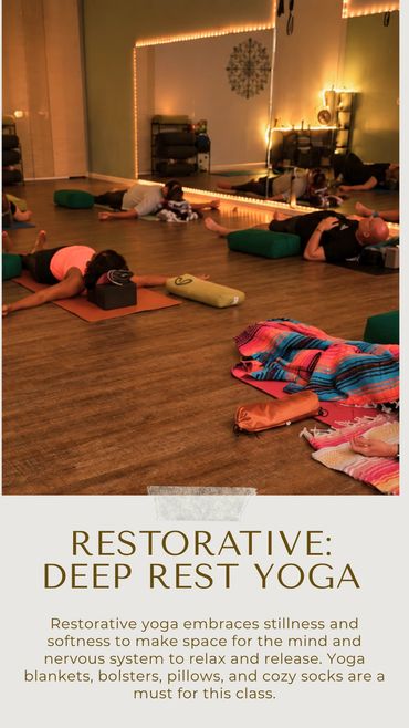 People resting with yoga props in a serene studio.