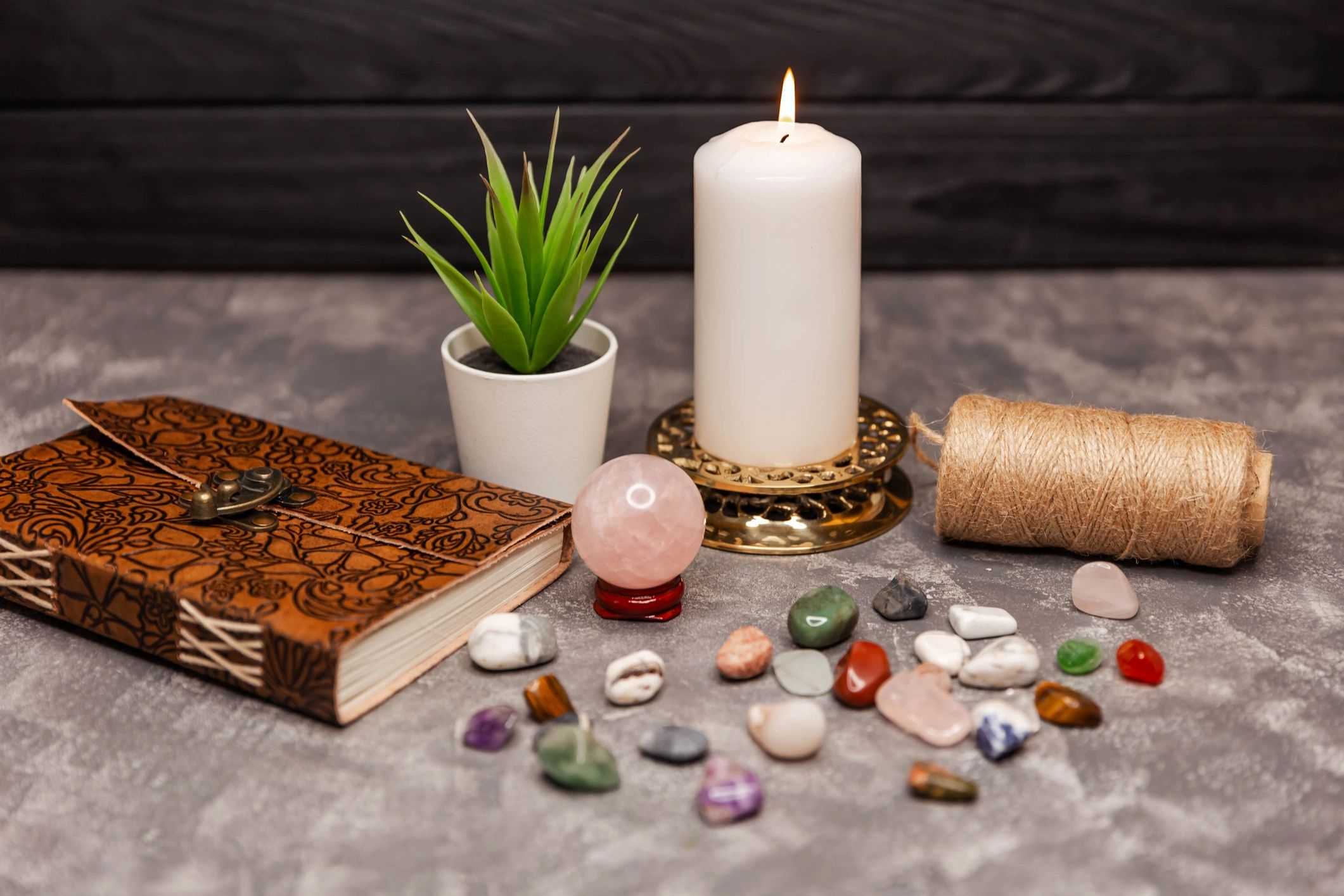 Minerals crystals and semi precious stones. Crystal ball surrounded by healing crystals.