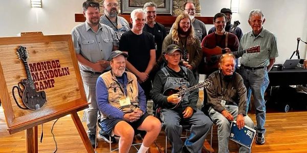 Group photo at Monroe Mandolin Camp with Alan Munde, Alan Bibey, Mike Compton, Jeff Burke, Don Macrostie, Mark Hembree, John Keith, Will Kimble, Scott Napier, Jeremy Wanless, Brian Christianson, and Willl Kimble.