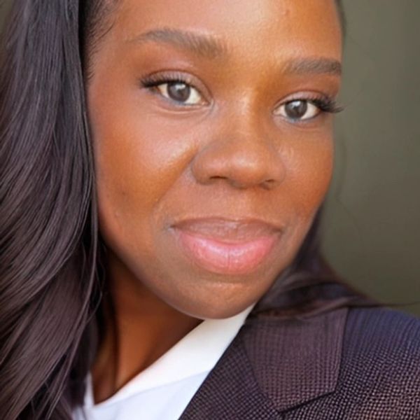 Close-up portrait of a woman with smooth skin.
