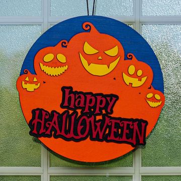 Colorful Halloween sign with jack-o'-lanterns and "Happy Halloween" text.