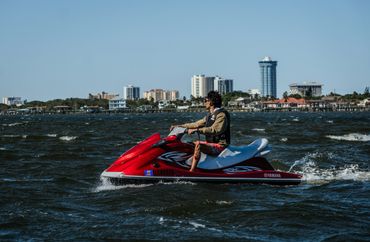 man riding a jet ski