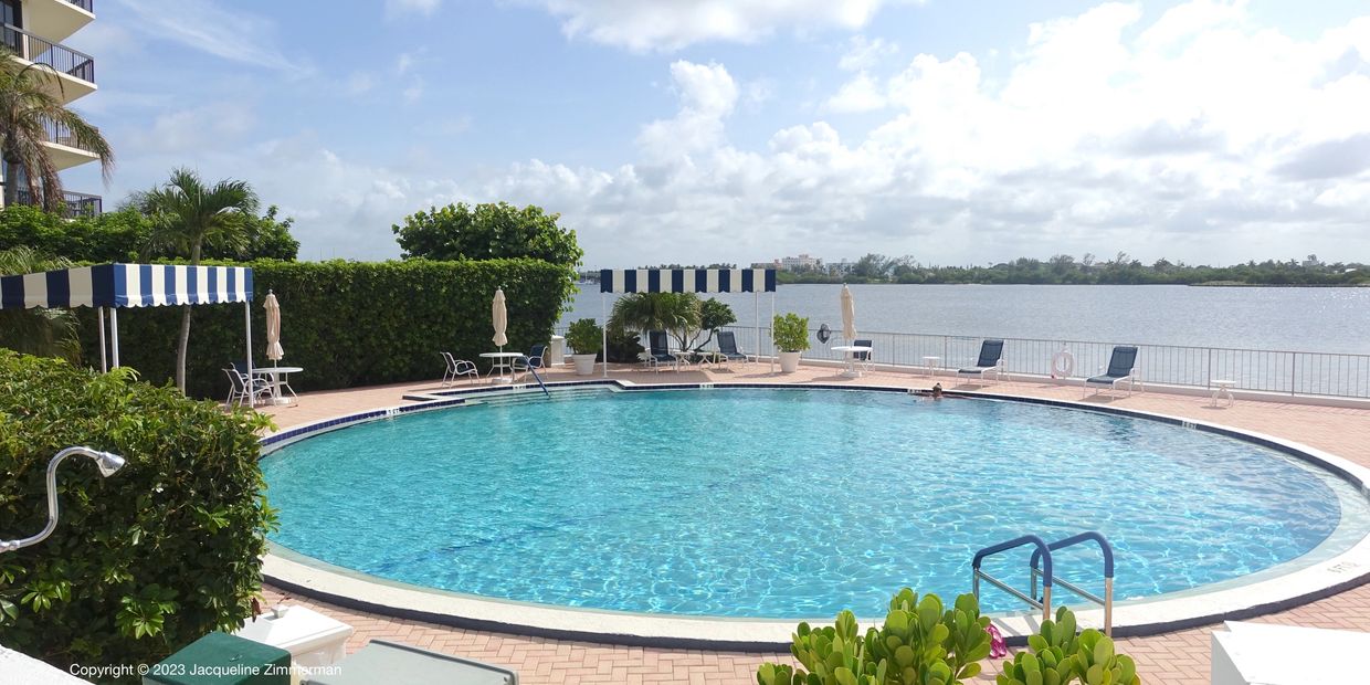 Carlyle House, Palm Beach, View of the pool, chairs, Intracoastal, condos for sale