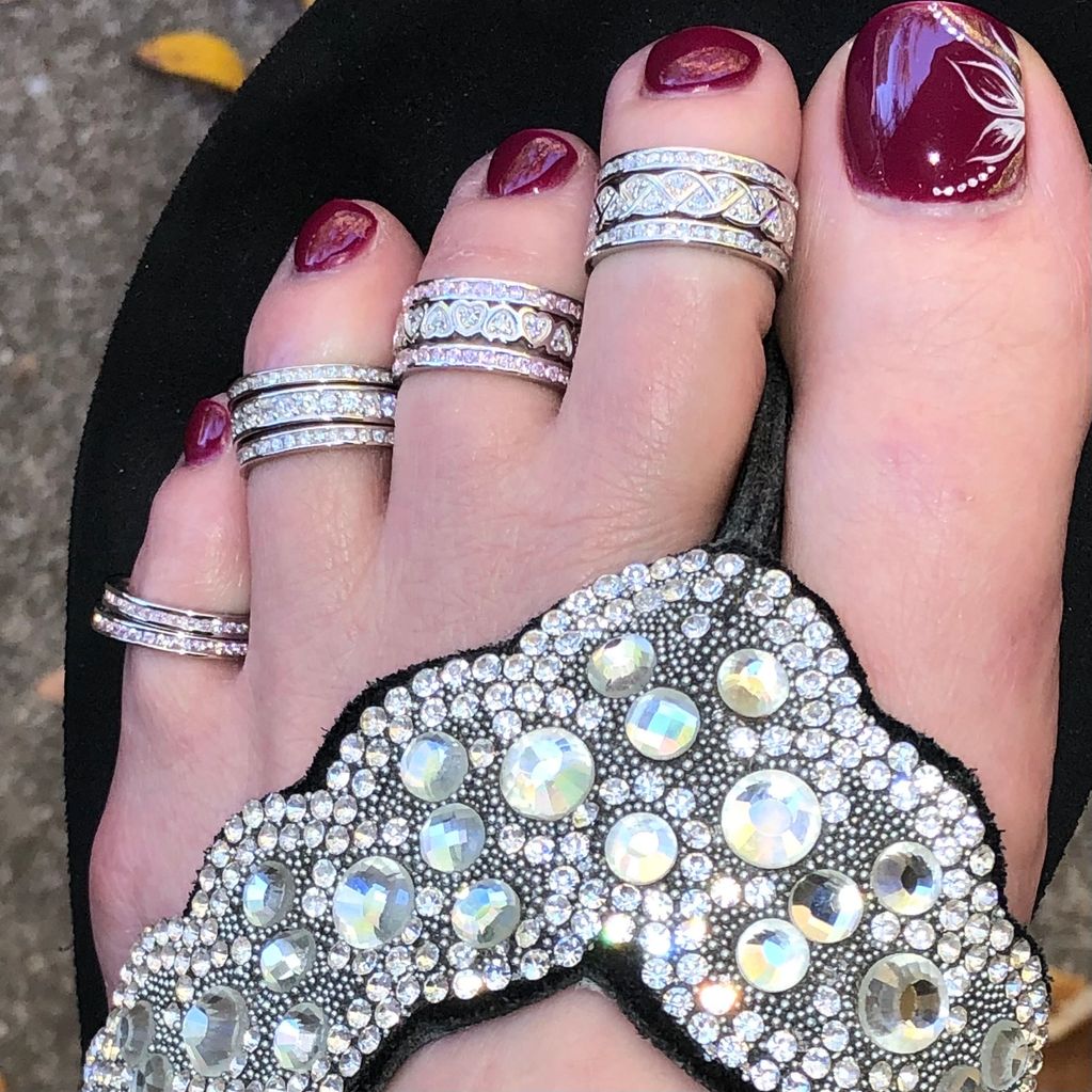 CZ rings for your toes.  Sized toe rings on 4 toes in different styles.