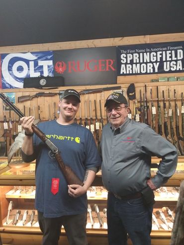 2020 Gun Raffle Winner - Steve Robinson (Muskingum County) with DVO Board Member Dennis Lavender