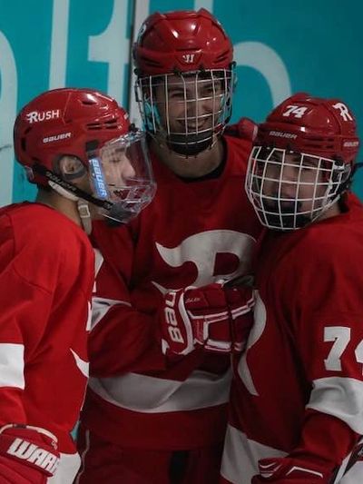 Three hockey players from Charlotte Rush Junior Hockey team including Matias Rosado.