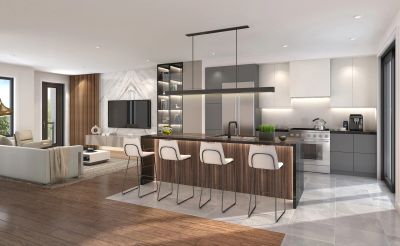 Modern open kitchen and living room with minimalist design and neutral colors.