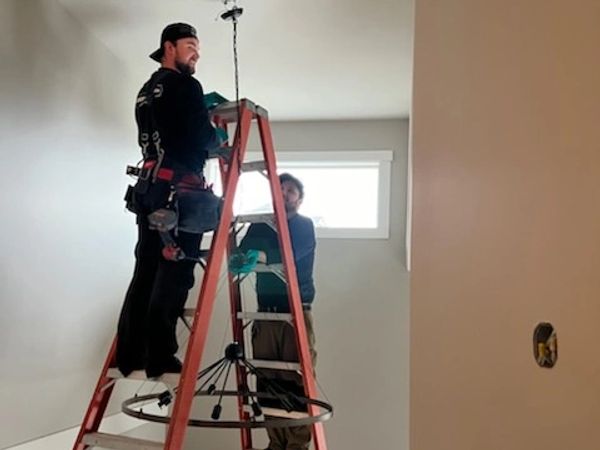 Chandelier installation in Juniper Ridge, Kamloops, British Columbia.