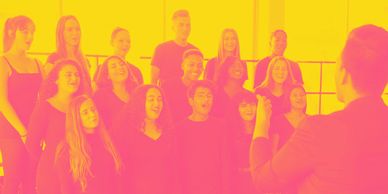 school choir singing with conductor
