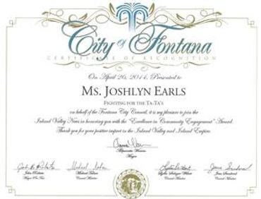 An award is given to Ms. Joshlyn Earls