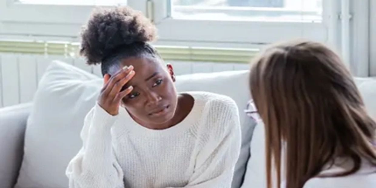Two women talking to each other