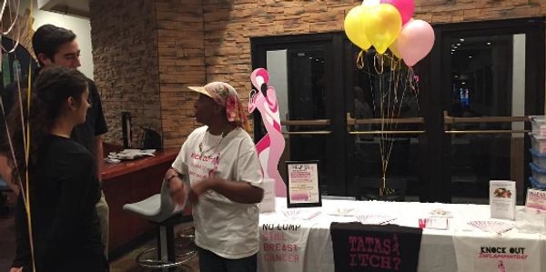 A table with shirts and balloons
